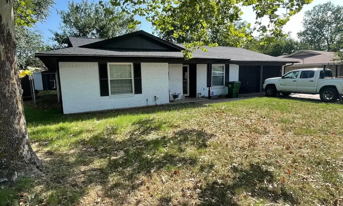 Professional roofing crew working on a residential roof in Bellingham